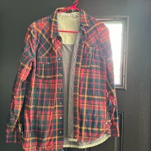 Women’s lined flannel jacket. In great condition. It’s a snap button up.